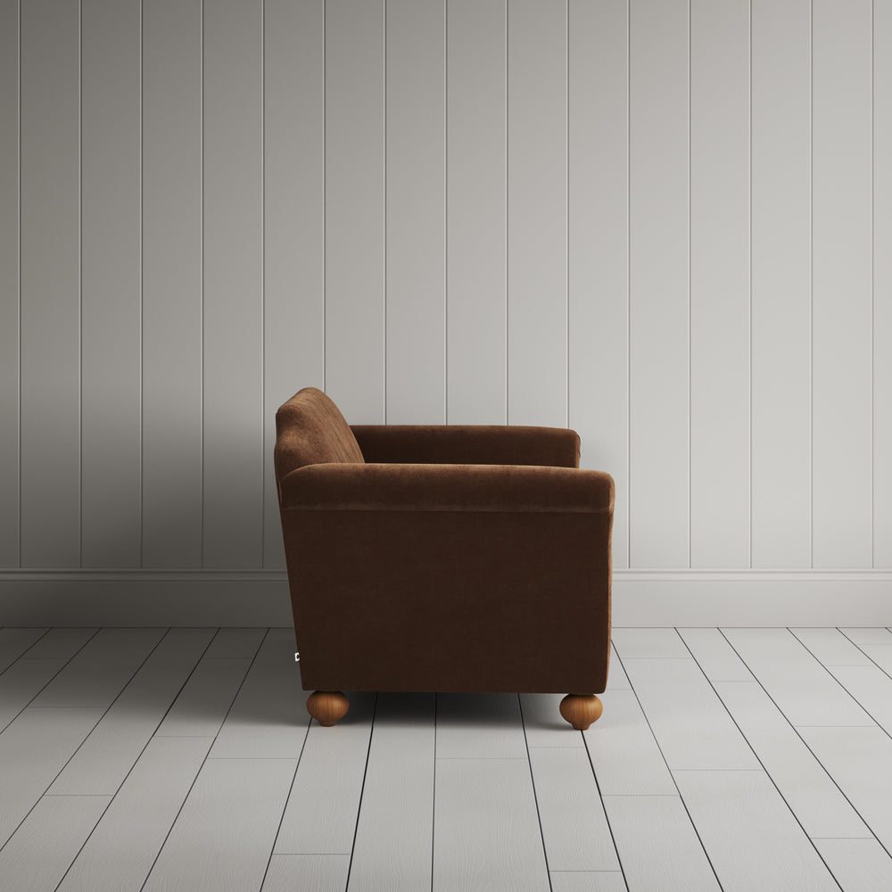 Side profile of the Tobacco corduroy Dolittle sofa,