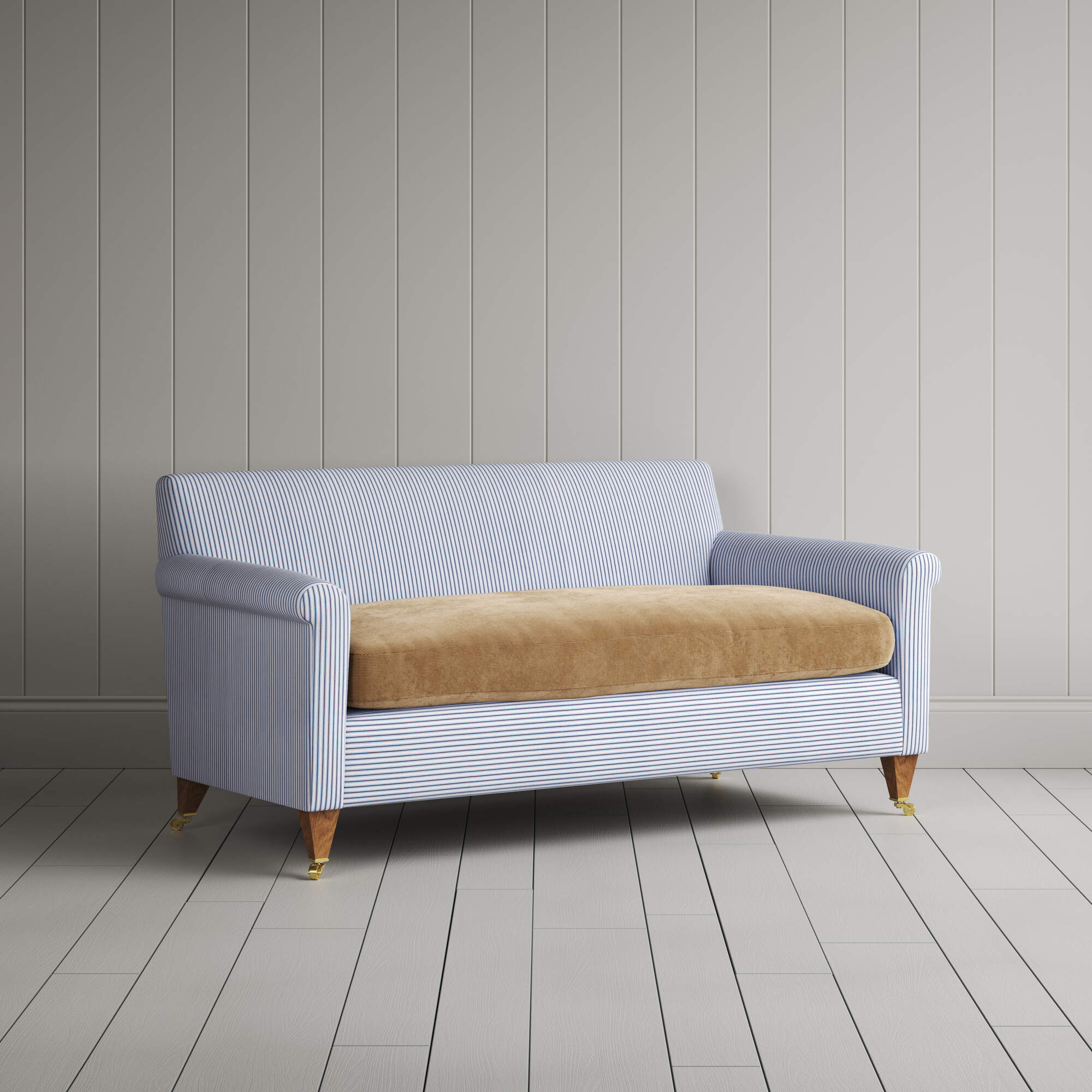 Angled view of the Ticking Aqua Brown Idler sofa by NiX