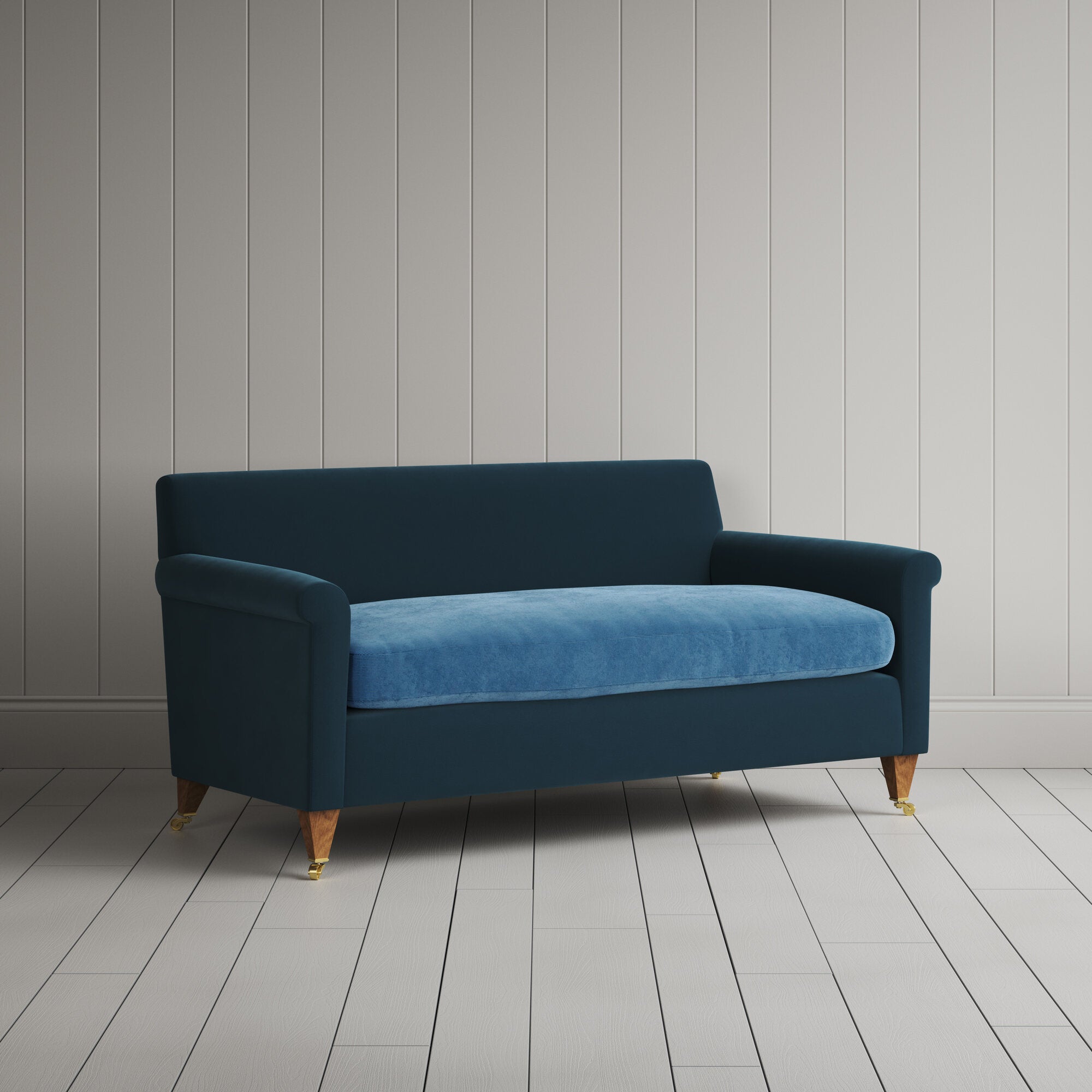 Angled view of the Velvet Aegean Idler sofa by NiX