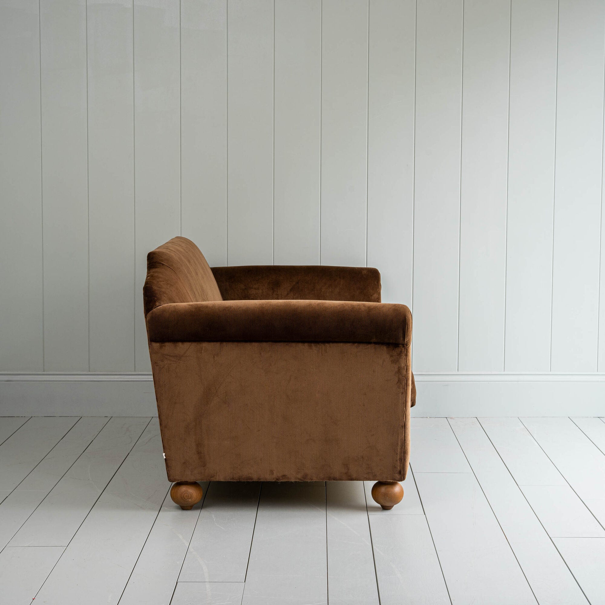 Side View of NiX Sofa in Tobacco Color