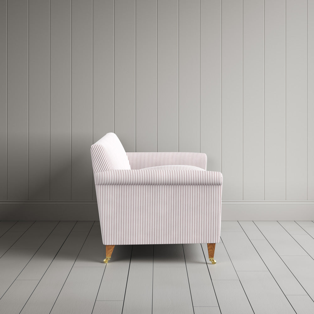 Side profile of the striped Idler sofa by Nicola Harding