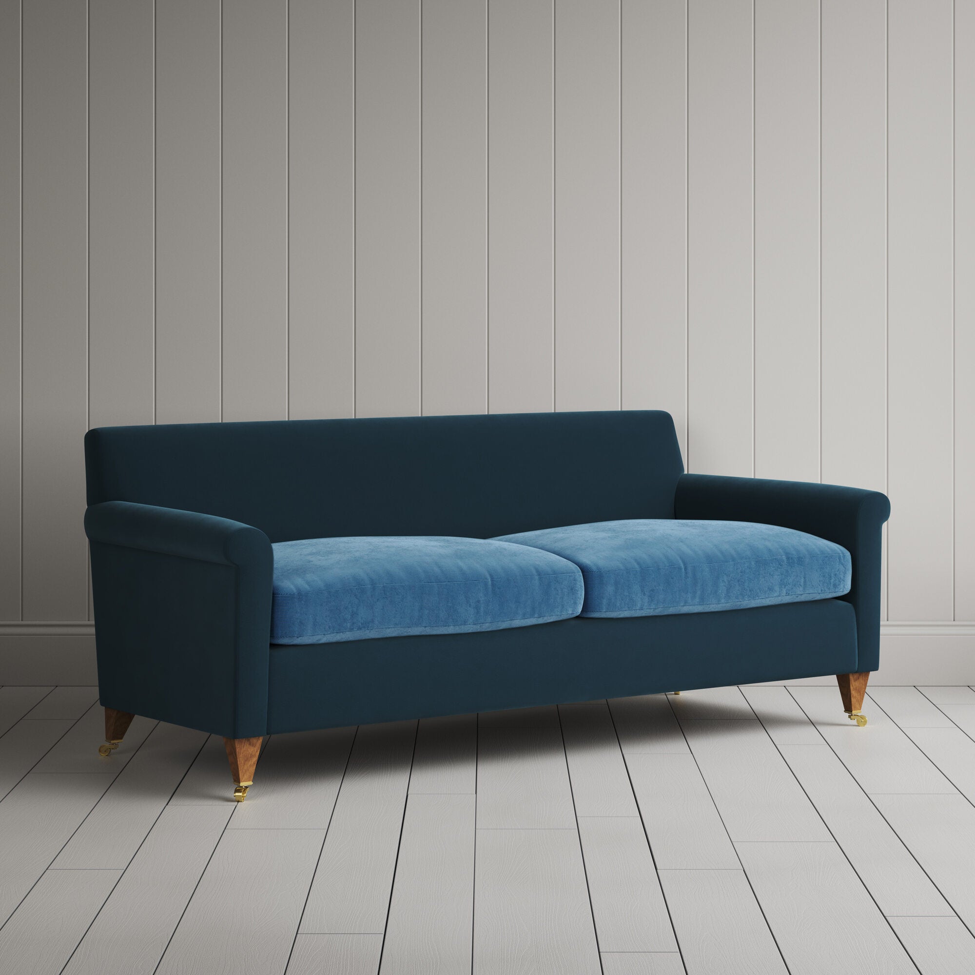 Angled view of the Velvet Aegean Idler sofa by NiX
