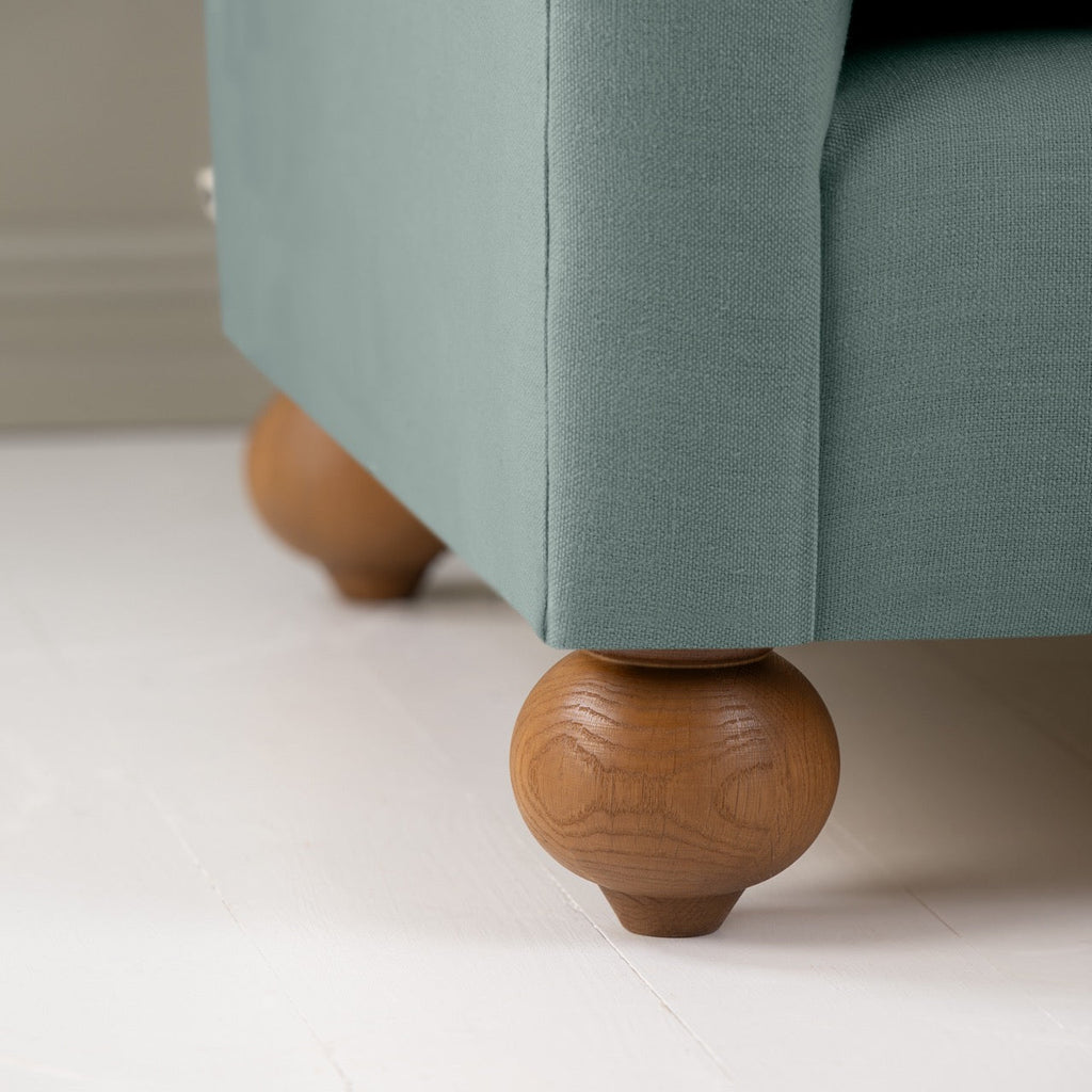 Dolittle 3 Seater Sofa in Laidback Linen Mineral, With Round Wooden Foot Closeup - Nicola Harding