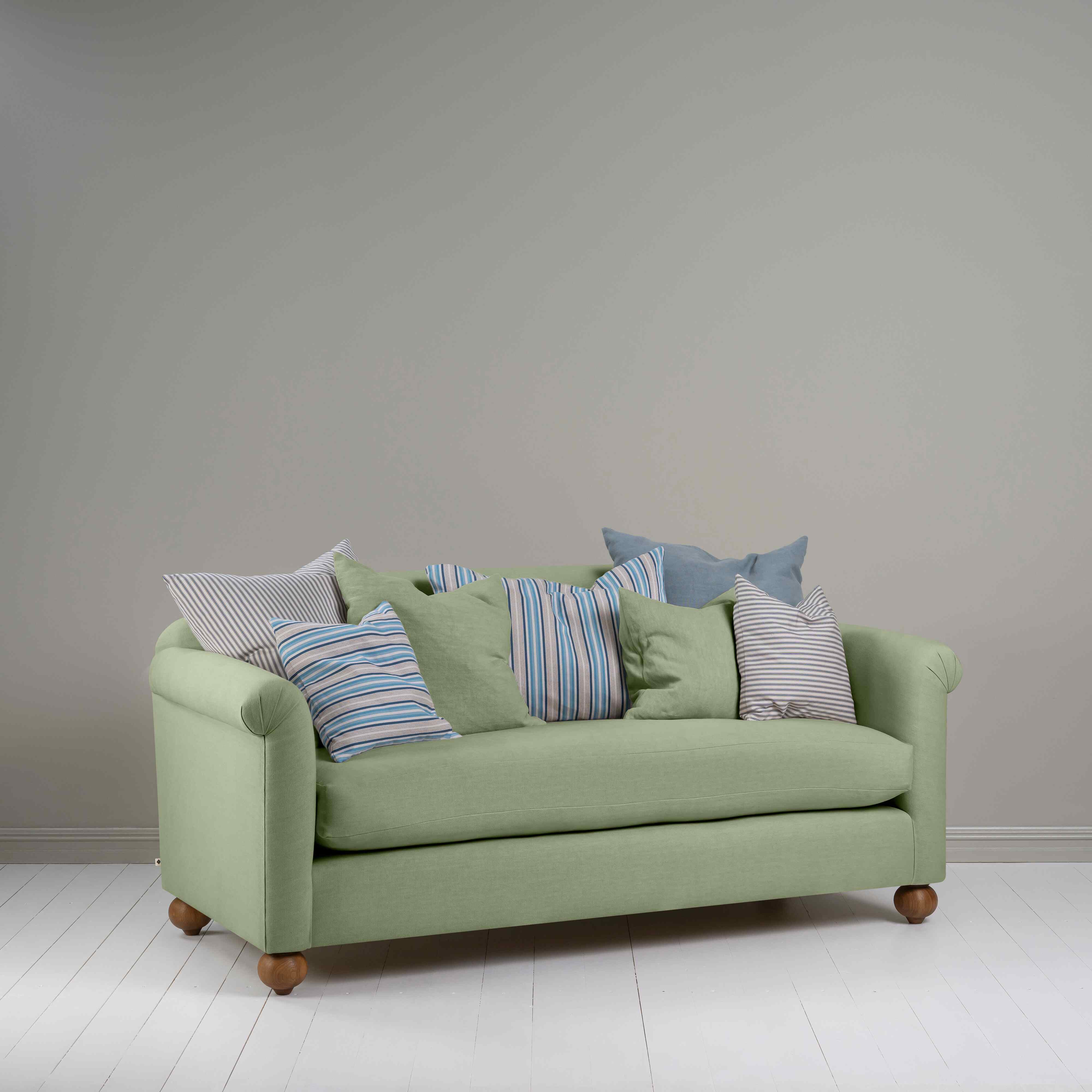 Dolittle 3 Seater Sofa in Laidback Linen Moss, 2 Matching and 5 Other Fabric NiX Cushions - Nicola Harding