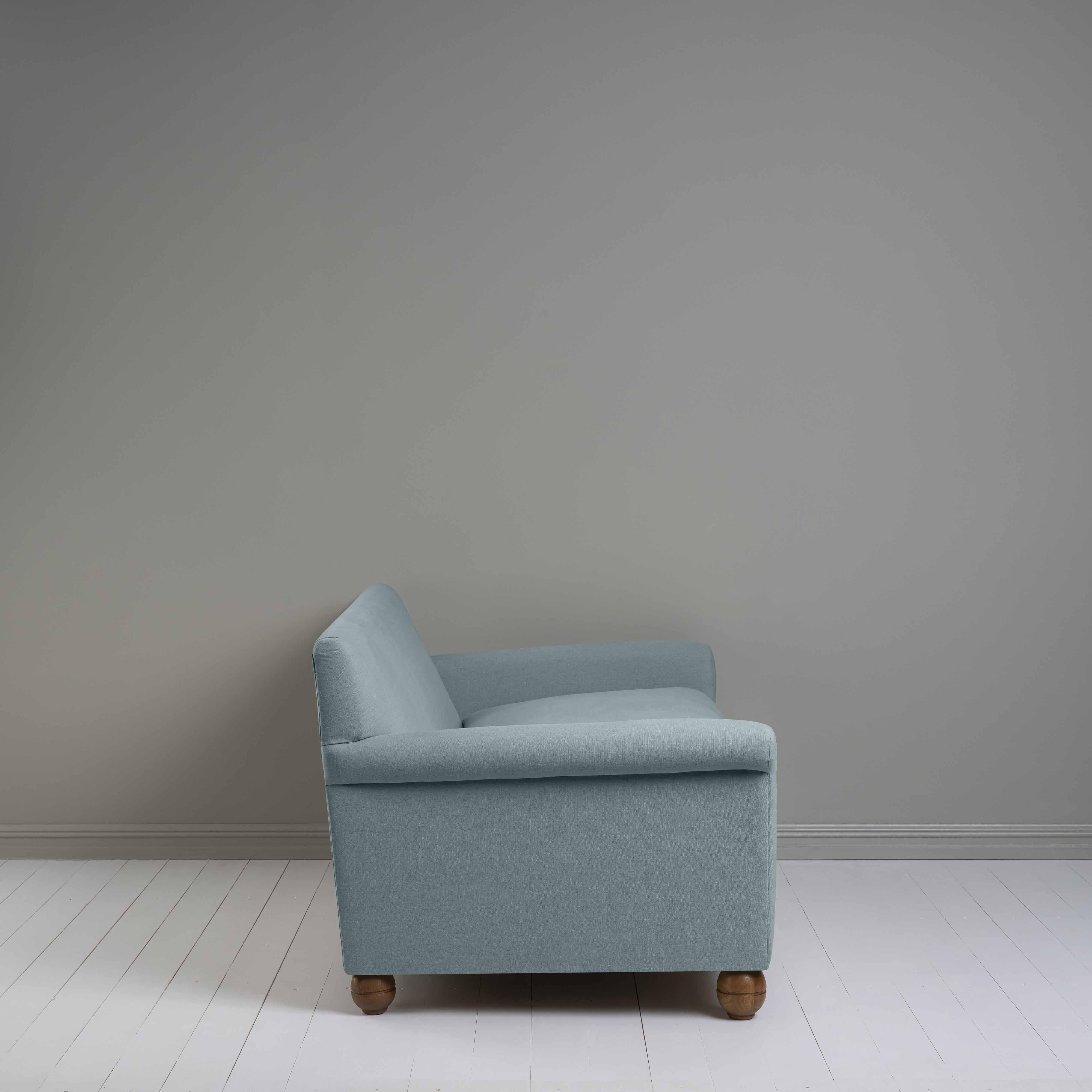 Side View of 4 seater sofa in Laidback Linen Cerulean - Nicola Harding & Co.