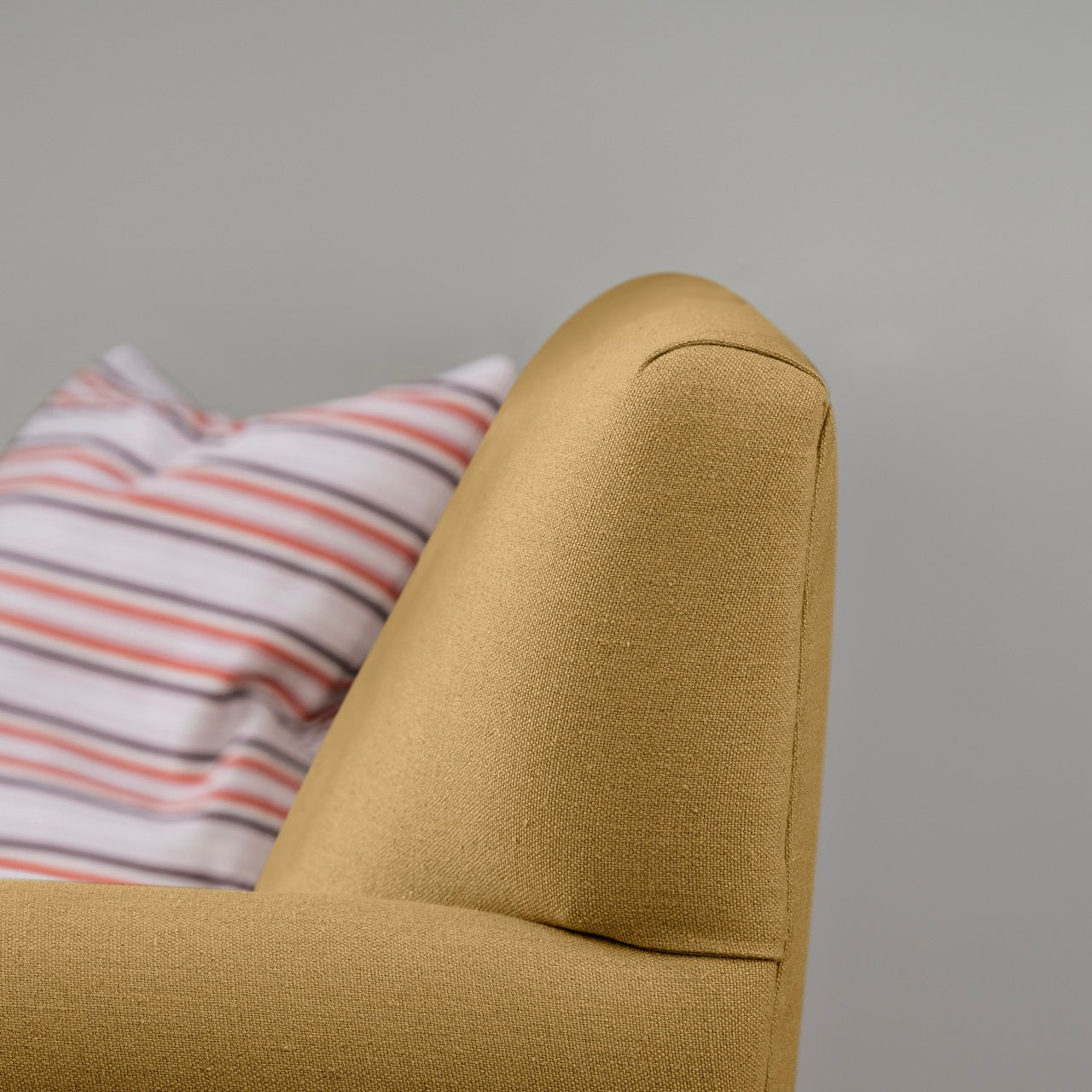 Design Closeup of 3 Seater Sofa in Yellow(Ochre) Color.