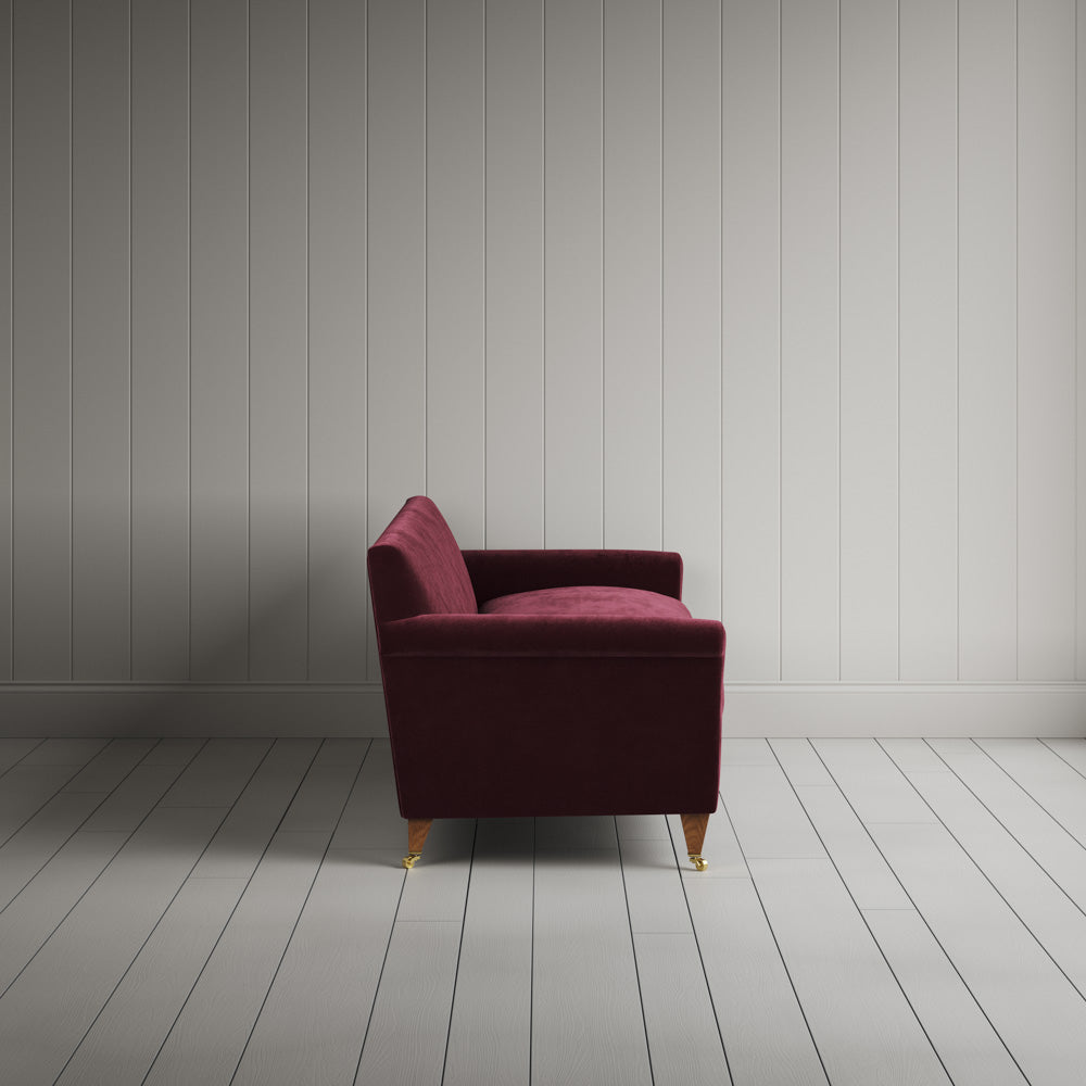 Side View of the Cherry corduroy Idler sofa - NiX