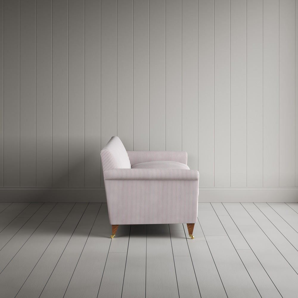Side profile of the striped Idler sofa by Nicola Harding