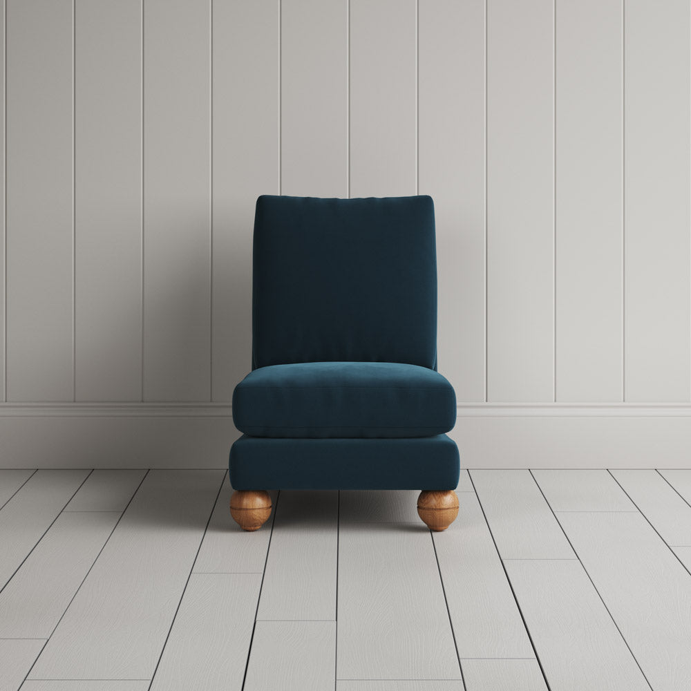 Perch Armchair in intelligent velvet aegean, full front view by Nicola Harding.