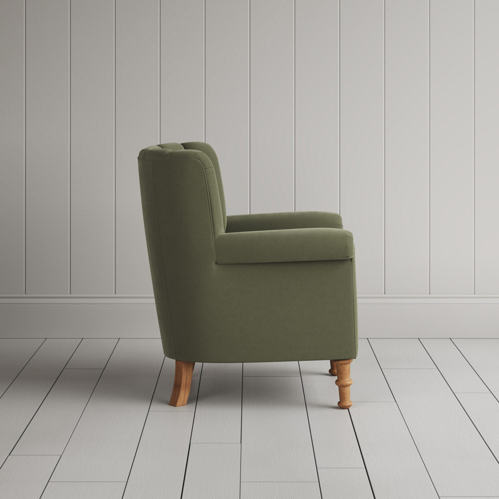 NiX interiors fluted back lounge chair silhouette profile view.