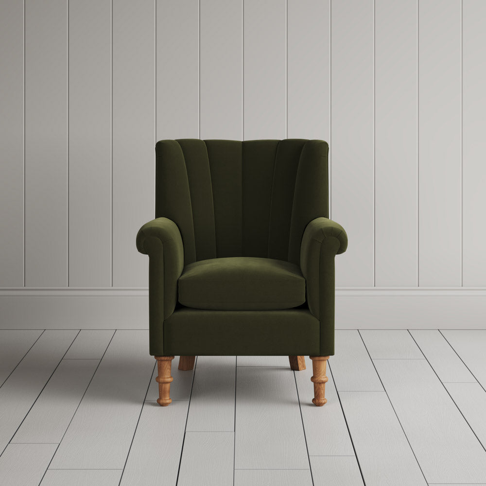 NiX furniture juniper velvet armchair with high fluted back, front studio shot.