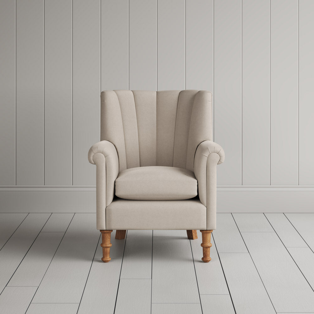 Time Out Armchair fluted back design in laidback linen dove, front view by Nicola Harding.