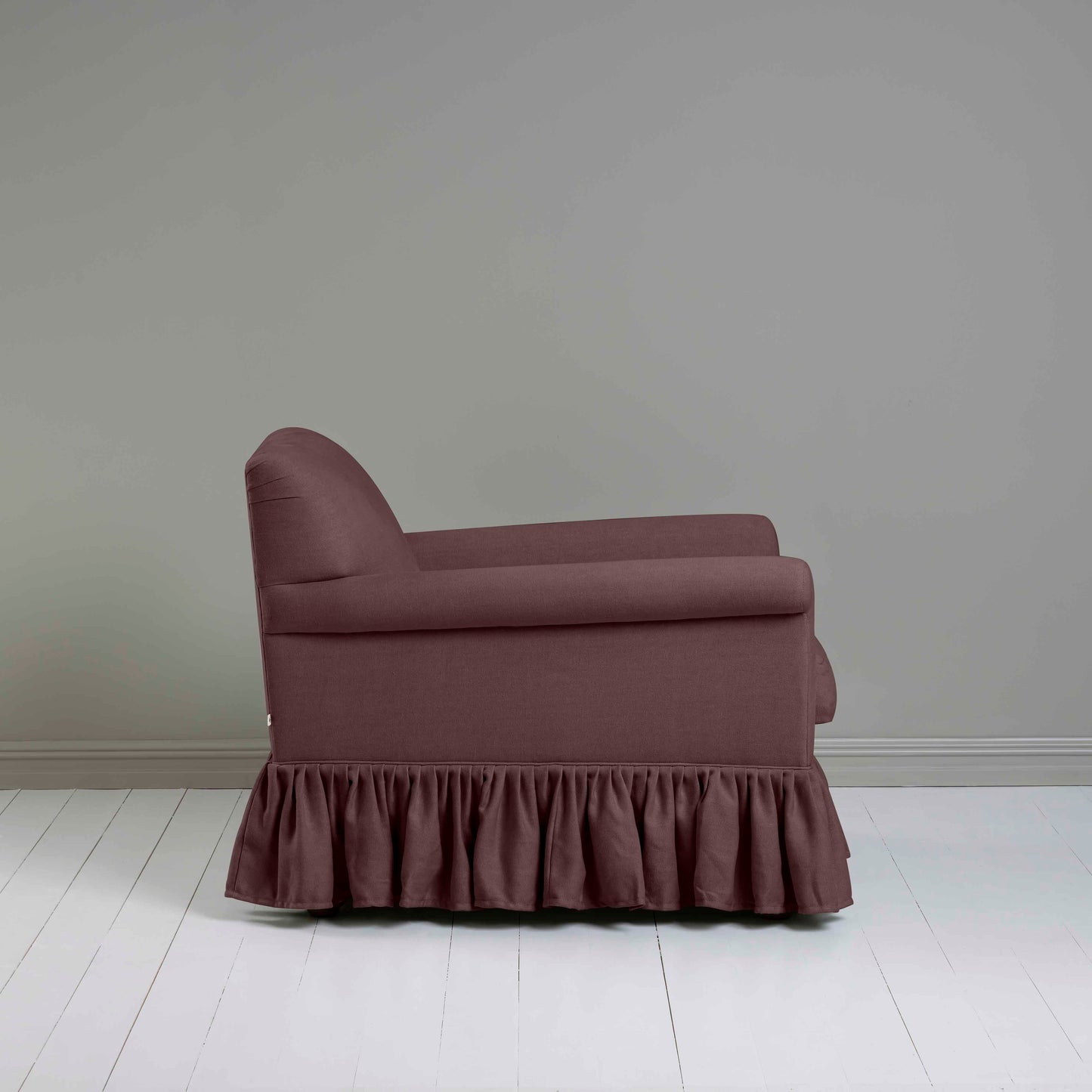 Curtain Call Armchair in Laidback Linen Damson, Side View - Nicola Harding