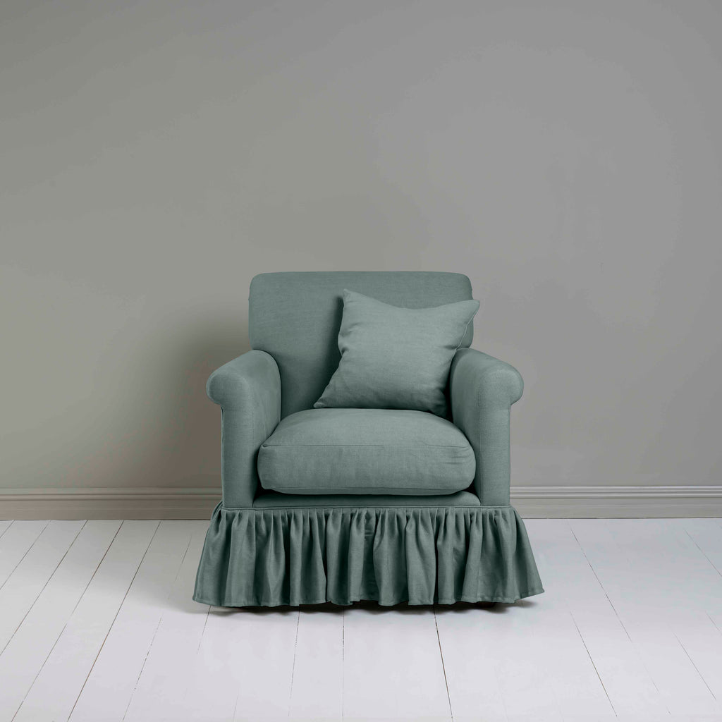 Curtain Call Armchair in Laidback Linen Mineral, With a Matching NiX Special Square Cushion from Front View - Nicola Harding