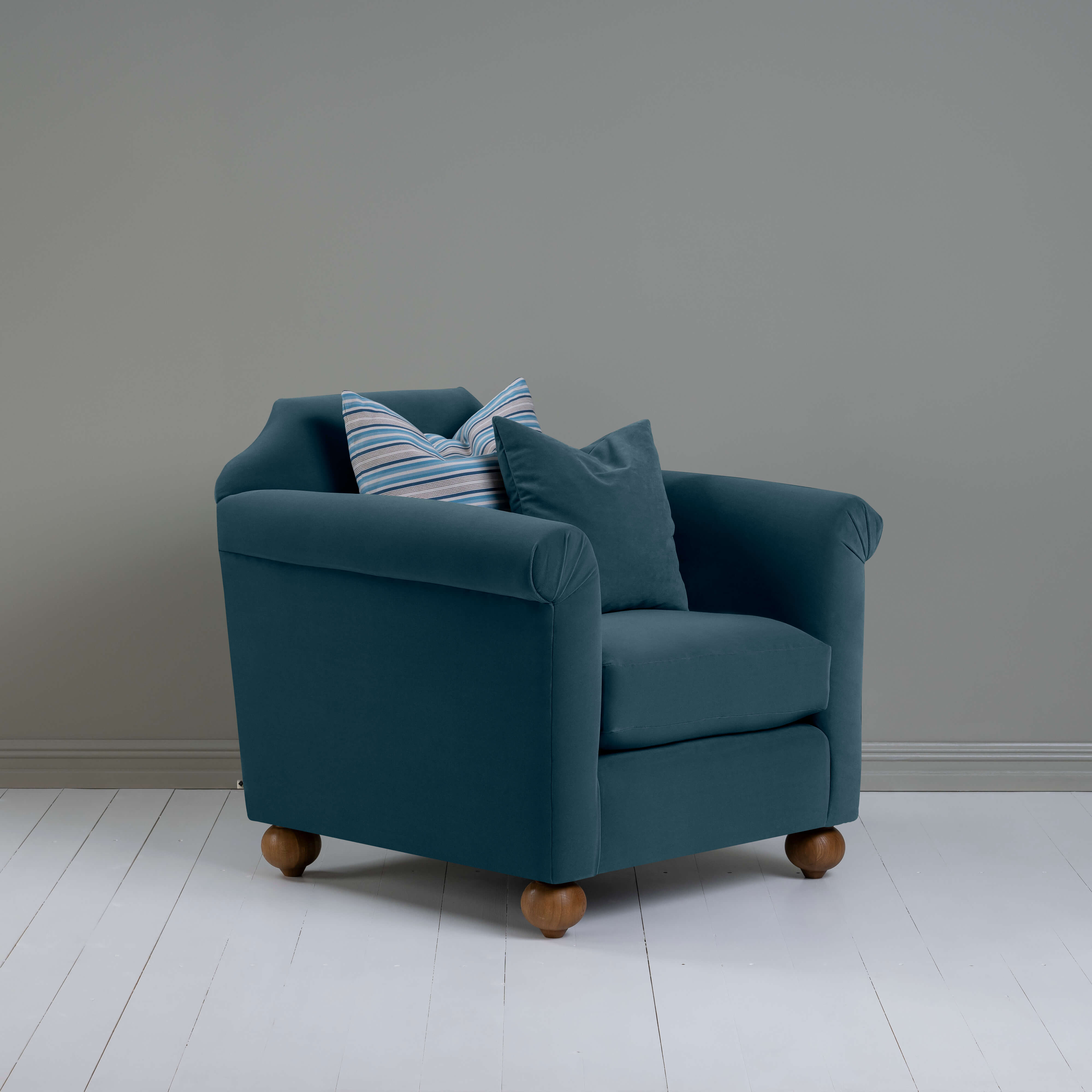 Dolittle Armchair in Intelligent Velvet Aegean, In Side View With 1 Matching and 1 Slow Lane Cotton Linen, Blue Cushion - Nicola Harding