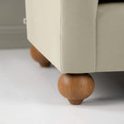 Dolittle Armchair in Intelligent Velvet Moonstone, Round Wooden Foot Closeup - Nicola Harding