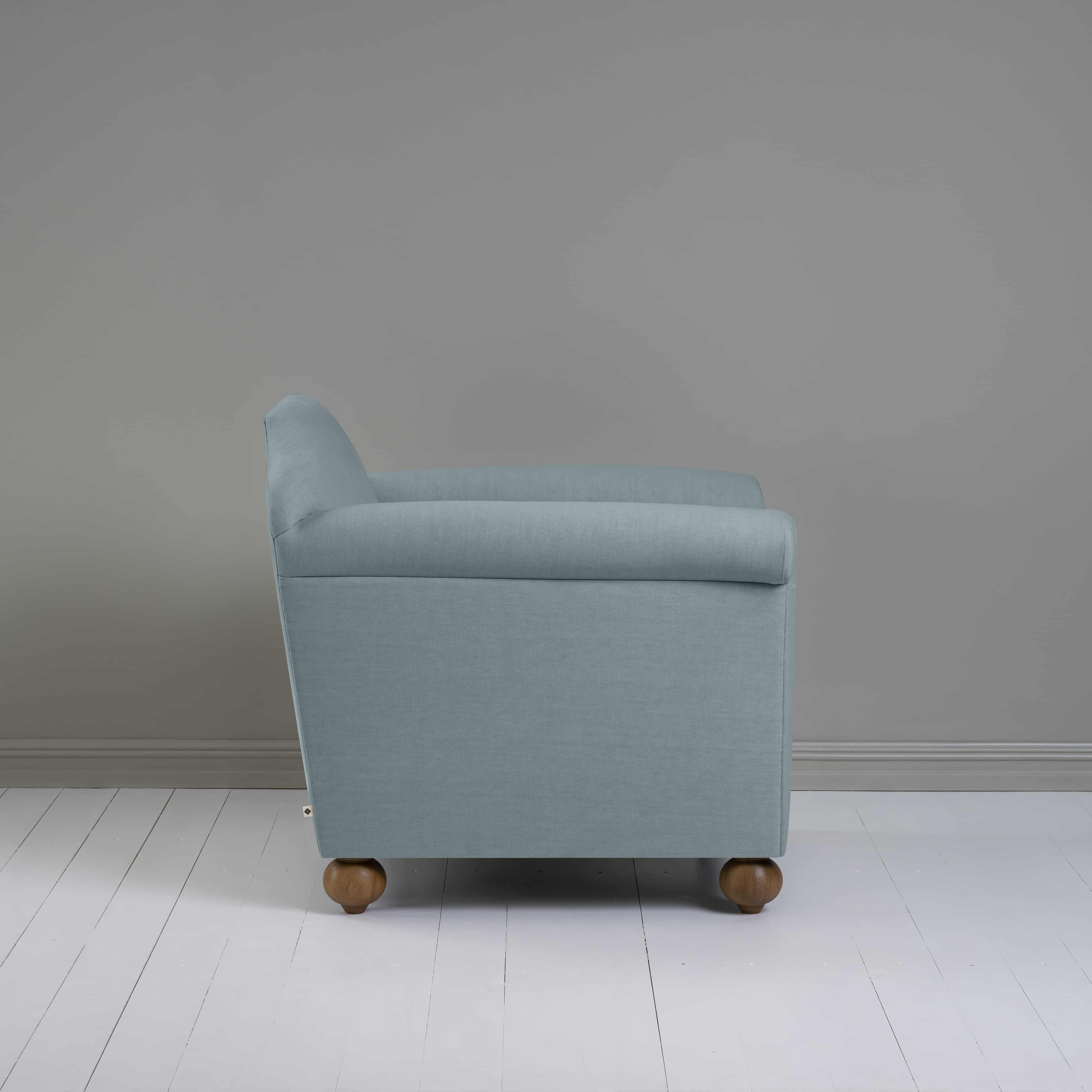 Dolittle Armchair in Laidback Linen Cerulean, Side View - Nicola Harding