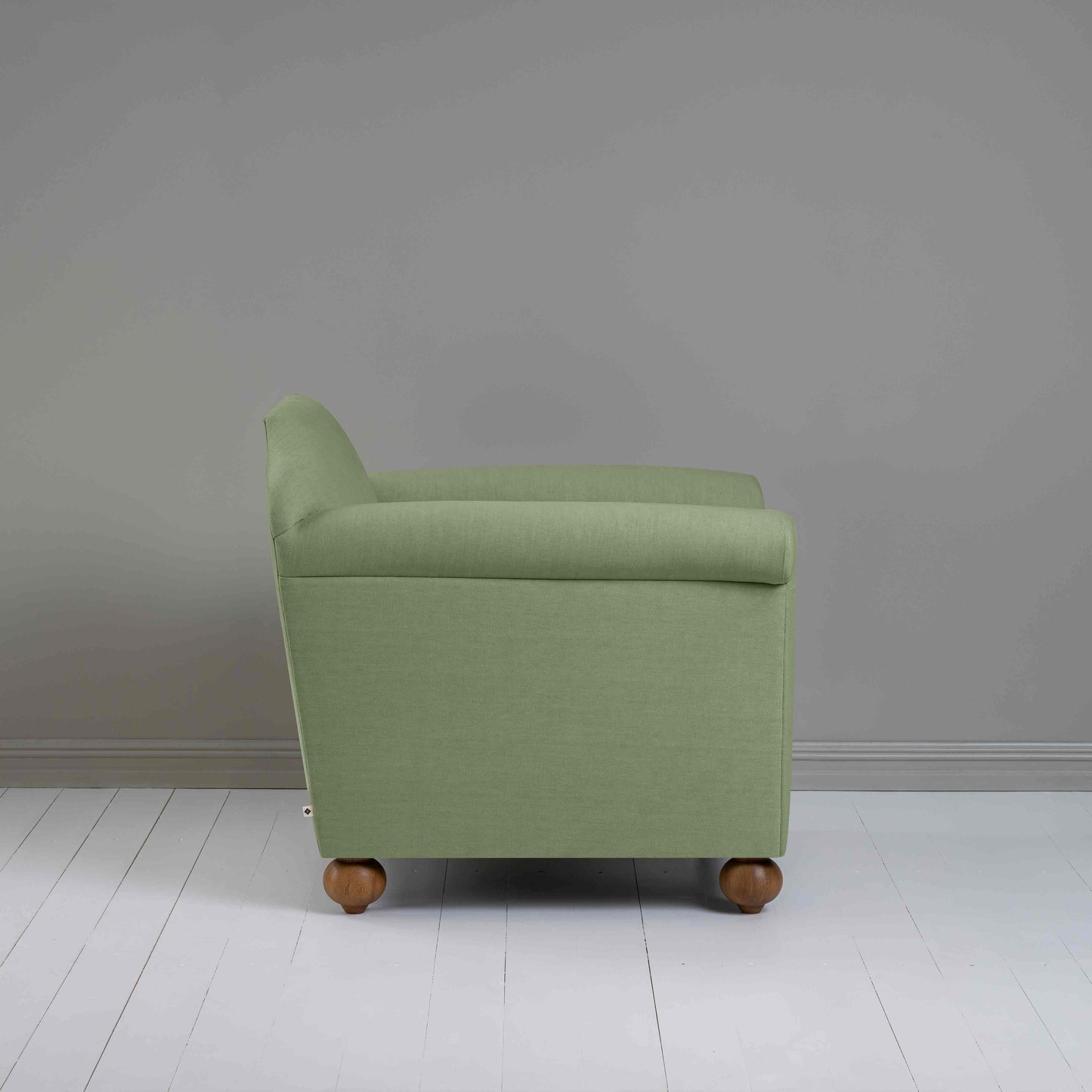 Dolittle Armchair in Laidback Linen Moss, Side View - Nicola Harding