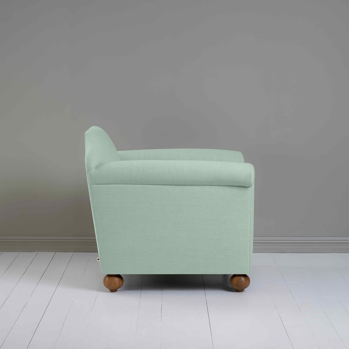 Dolittle Armchair in Laidback Linen Sky, Side View - Nicola Harding