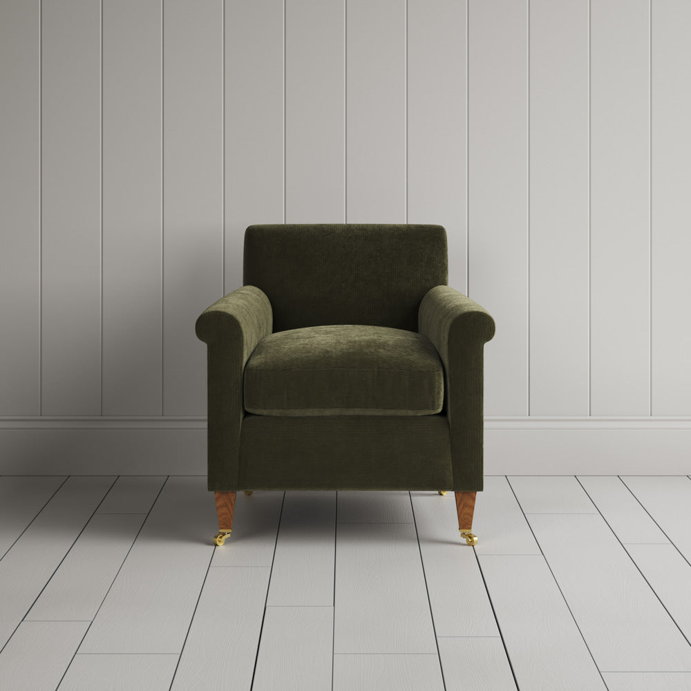 Idler Armchair in Caper Classic Corduroy, an olive green UK handmade reading chair.