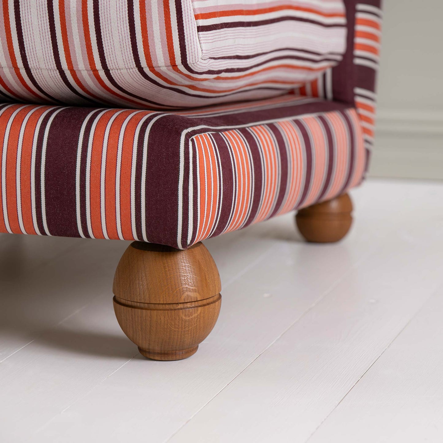 Slipper Armchair In Regatta Cotton Flame Frame and Slow Lane Cotton Linen Berry Seat, Round Wooden Foot Closeup - By NiX