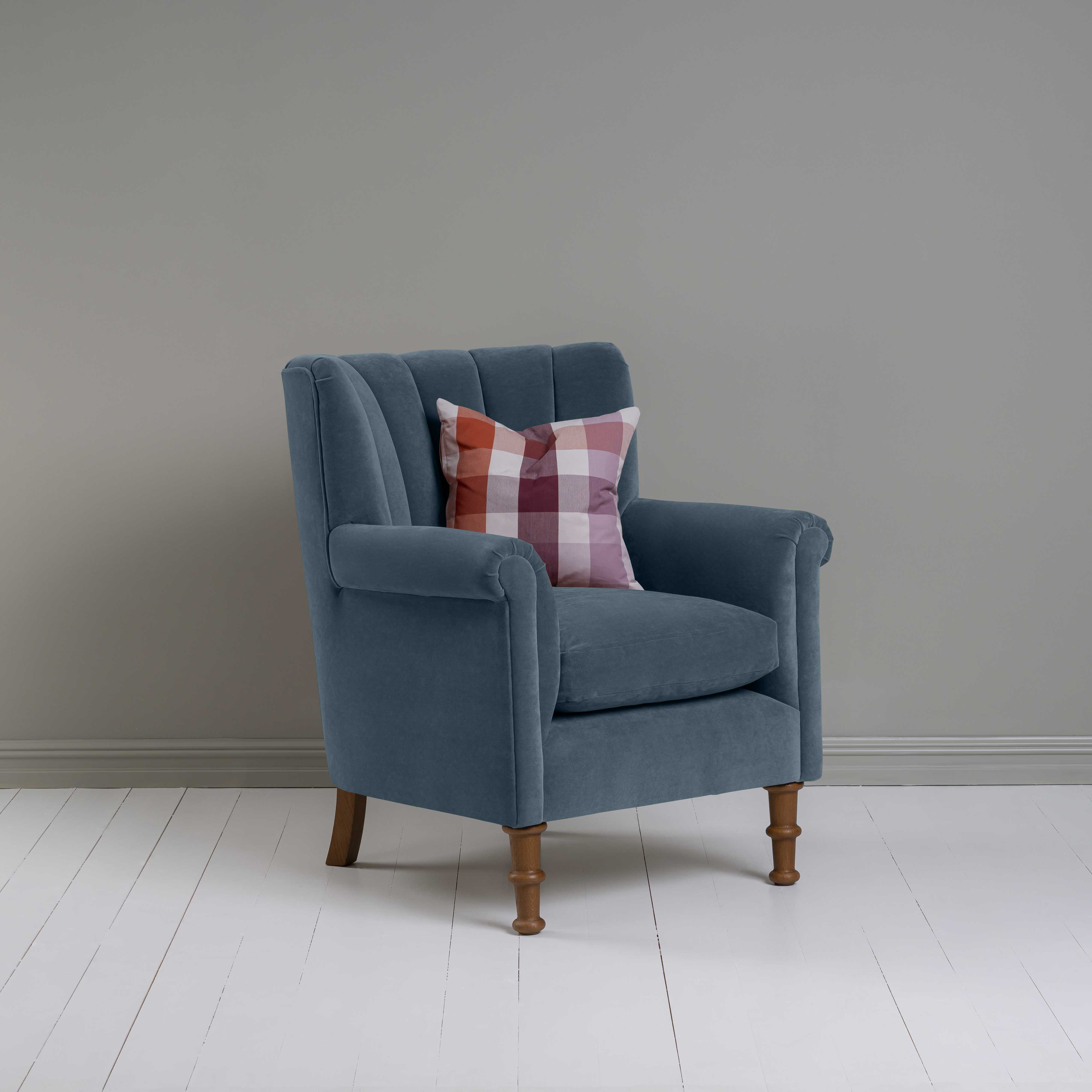 Time Out Armchair in Intelligent Velvet Aegean, Side View With Cushion - NiX