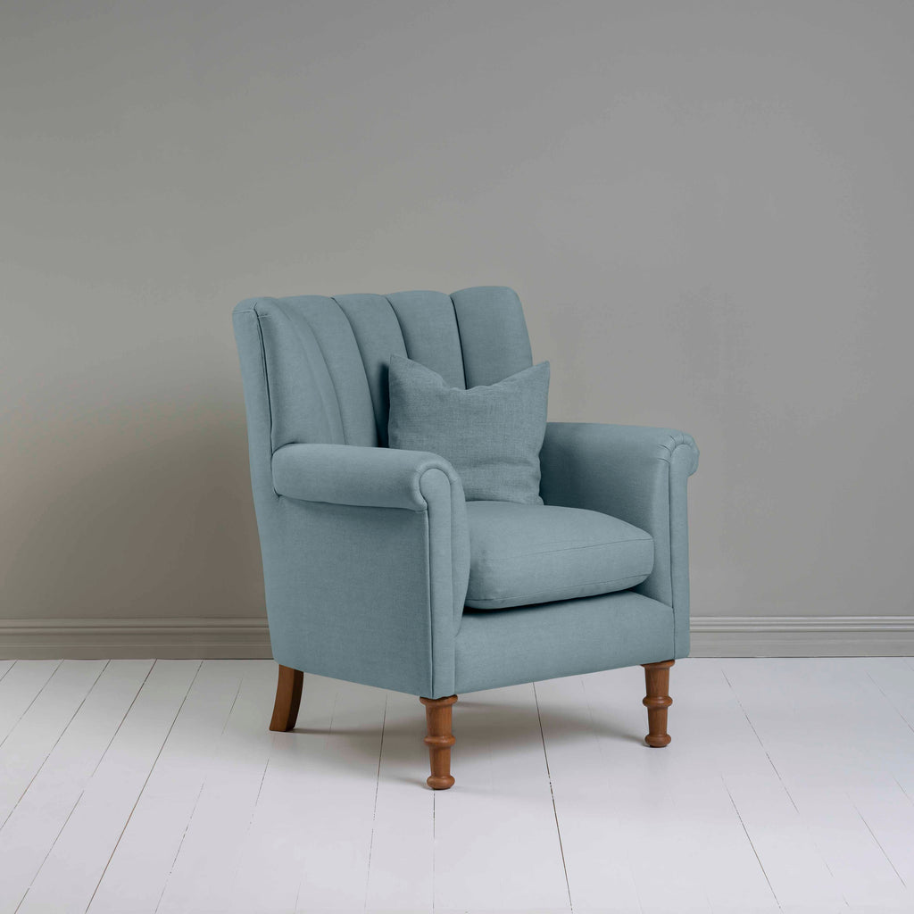Time Out Armchair in Laidback Linen Cerulean, Side View With Matching Cushion - NiX