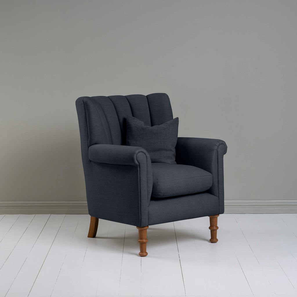 Time Out Armchair in Laidback Linen Midnight, Side View With Matching Cushion - NiX