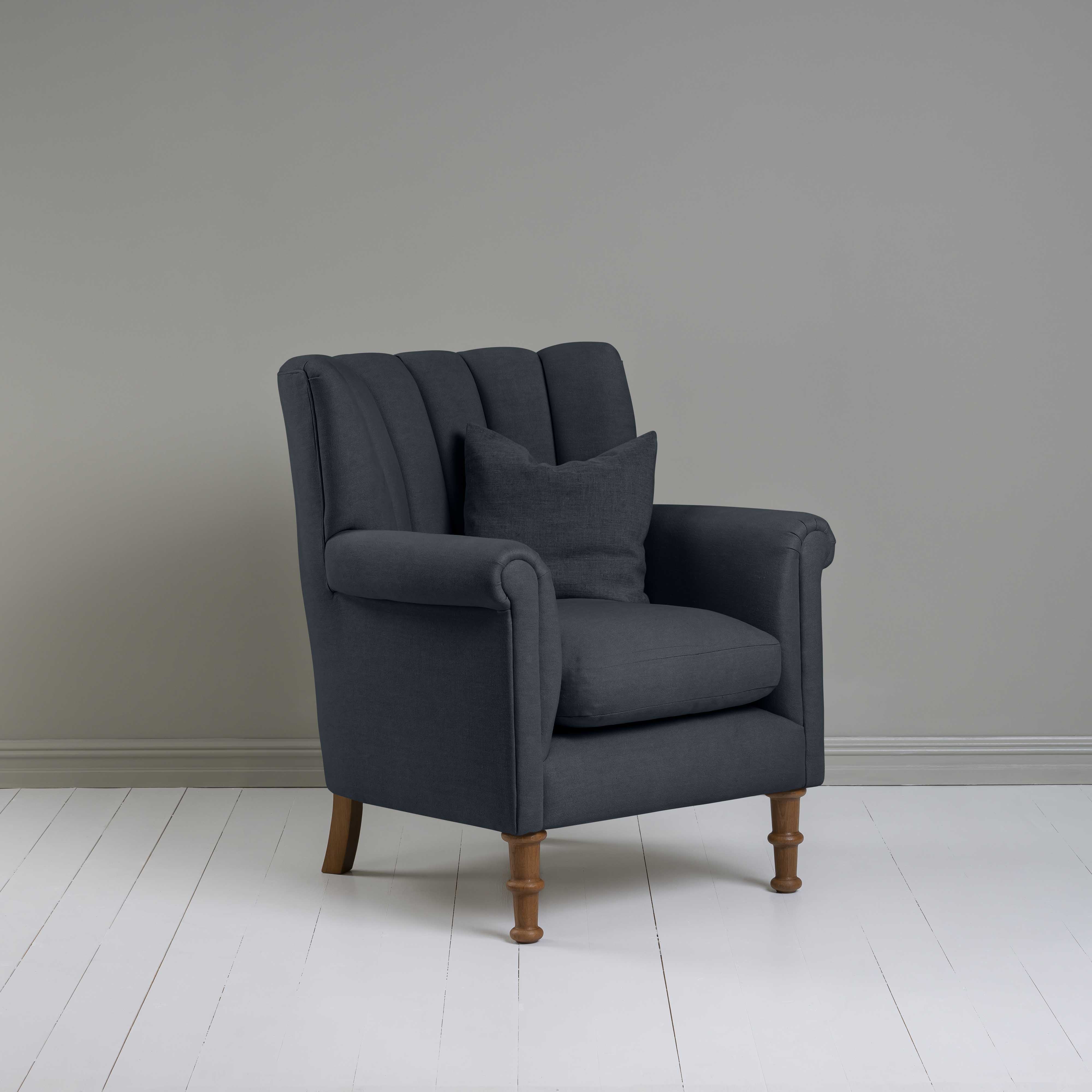 Time Out Armchair in Laidback Linen Midnight, Side View With Matching Cushion - NiX