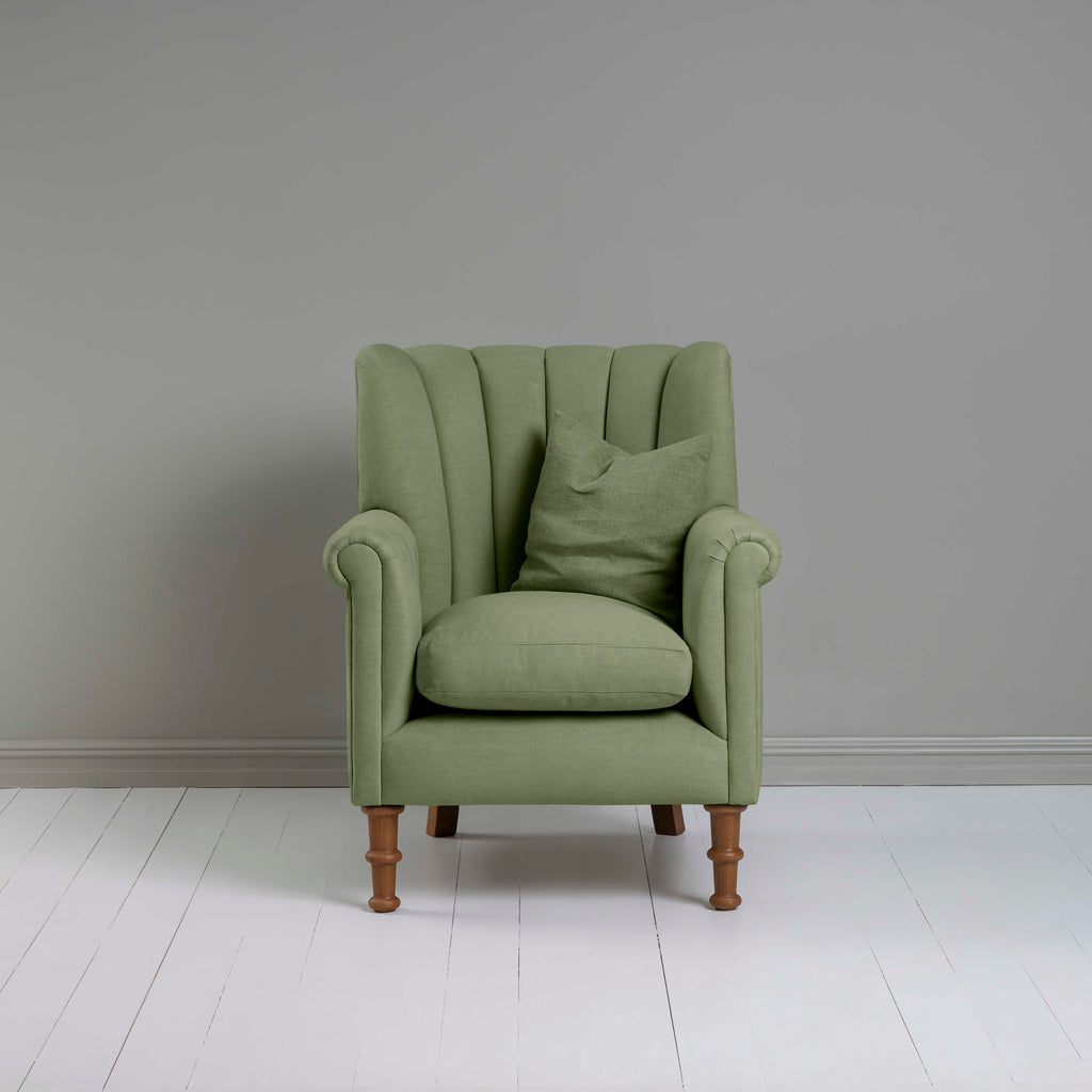 Time Out Armchair in Laidback Linen Moss, Front View With Matching Cushion - NiX
