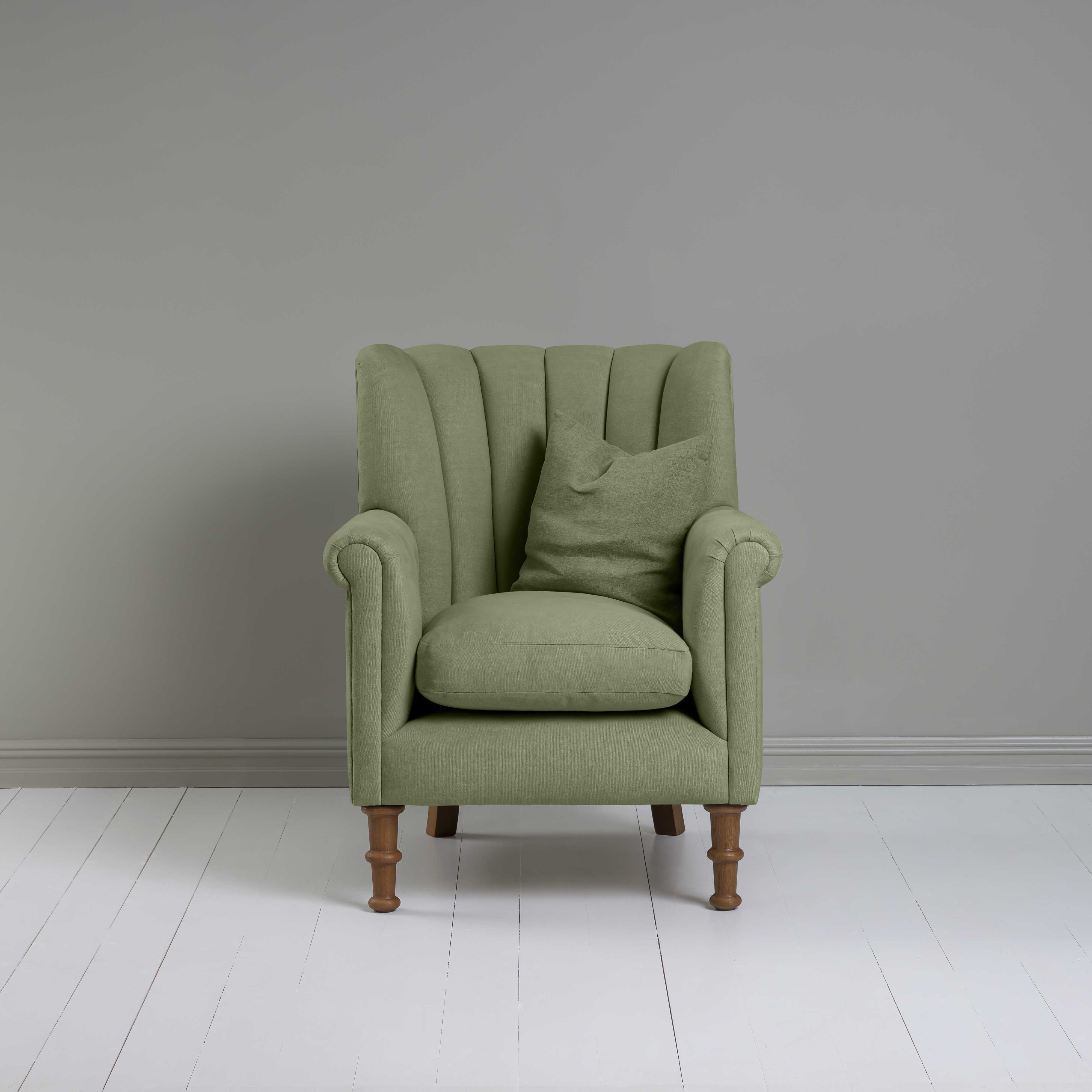 Time Out Armchair in Laidback Linen Moss, Front View With Matching Cushion - NiX