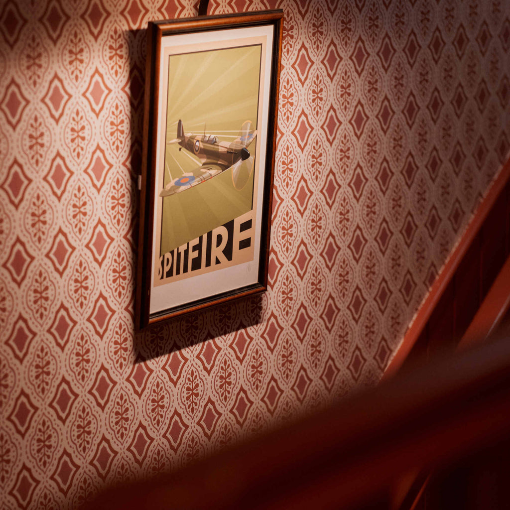 A picture on Rhombus Wallpaper in Rhubarb and Pink - Nicola Harding & Co.