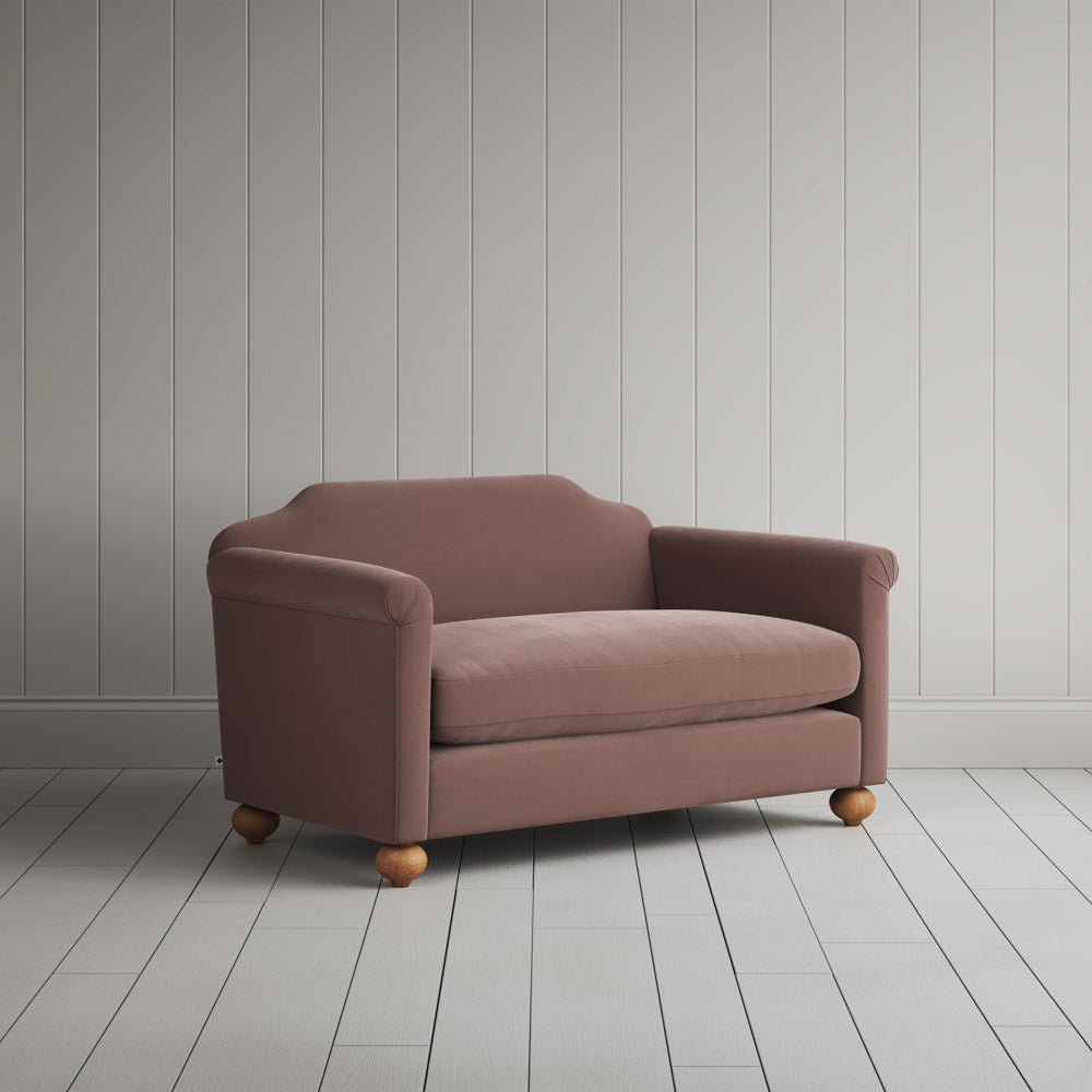 Angled view of the Velvet Dusky Pink Idler love seat by NiX