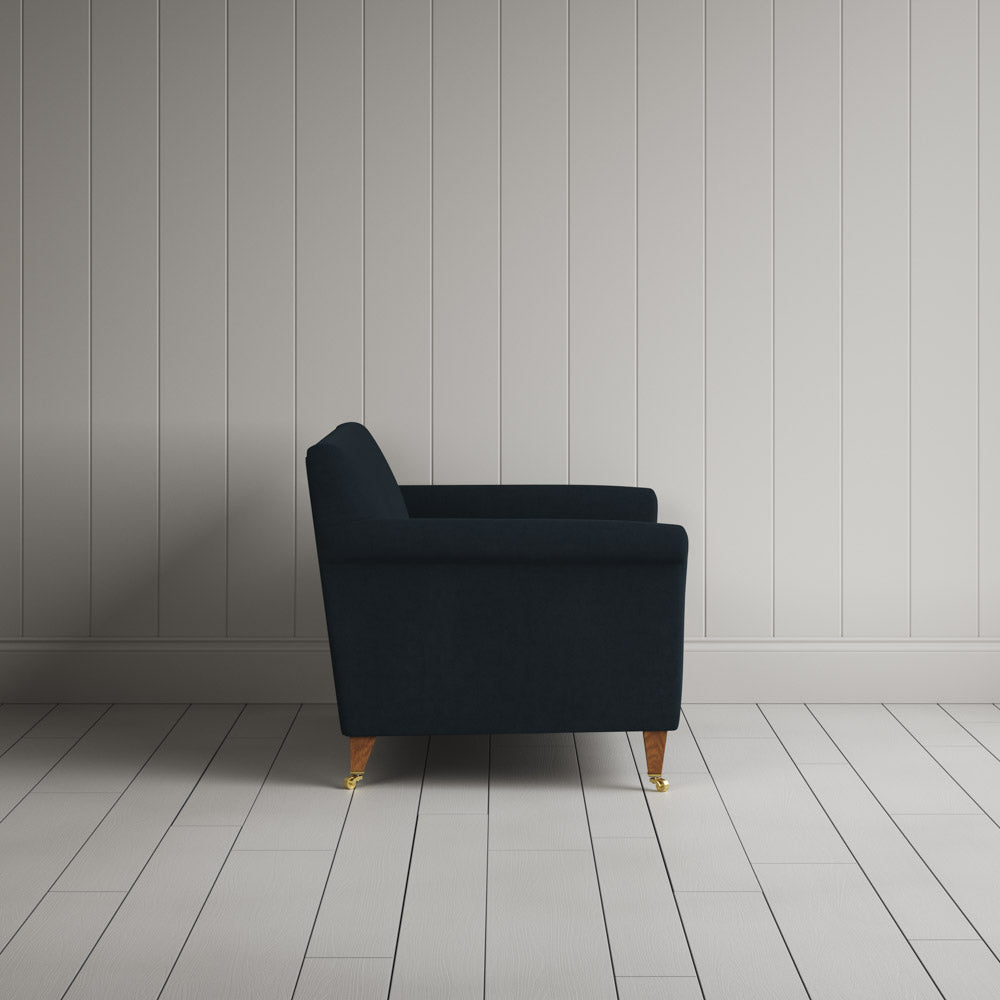 Side profile of the Idler seat in Midnight Laidback Linen by Nix.