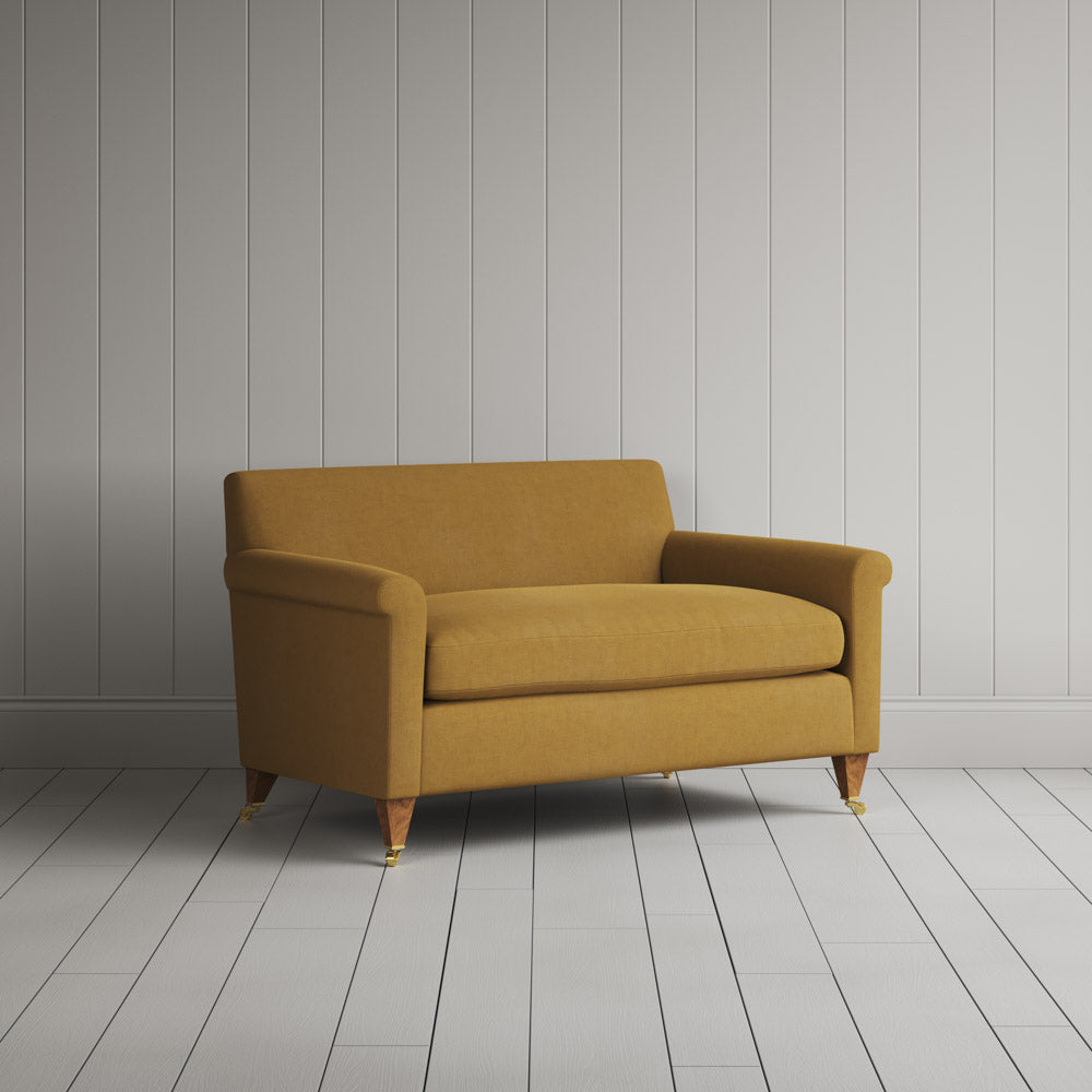 Side profile of the Idler seat in Ochre Laidback Linen by Nix.