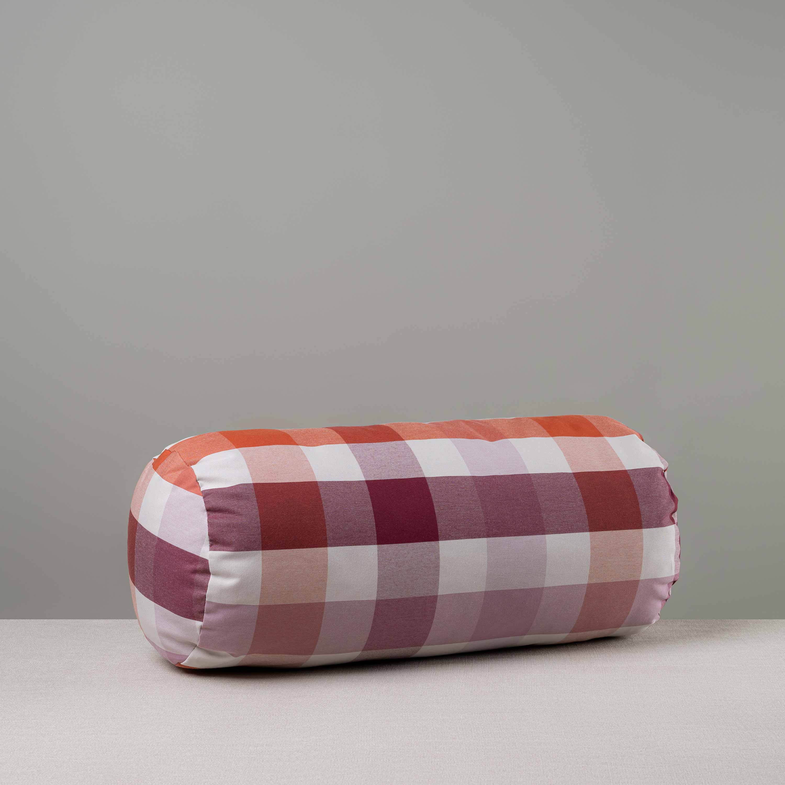 Bask Bolster Cushion in Checkmate Cotton, Berry - Nicola Harding