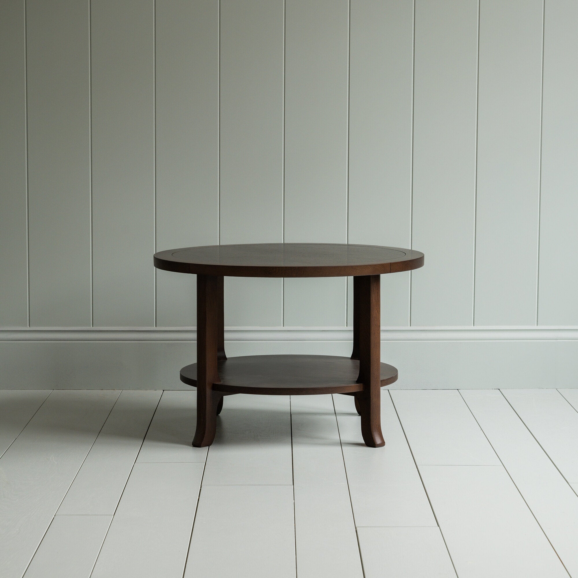 Round coffee table in smoky stained oak Manufacture in London By NiX Furniture Studio