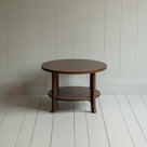 Round coffee table in smoky stained oak Manufacture in London By NiX Furniture Studio