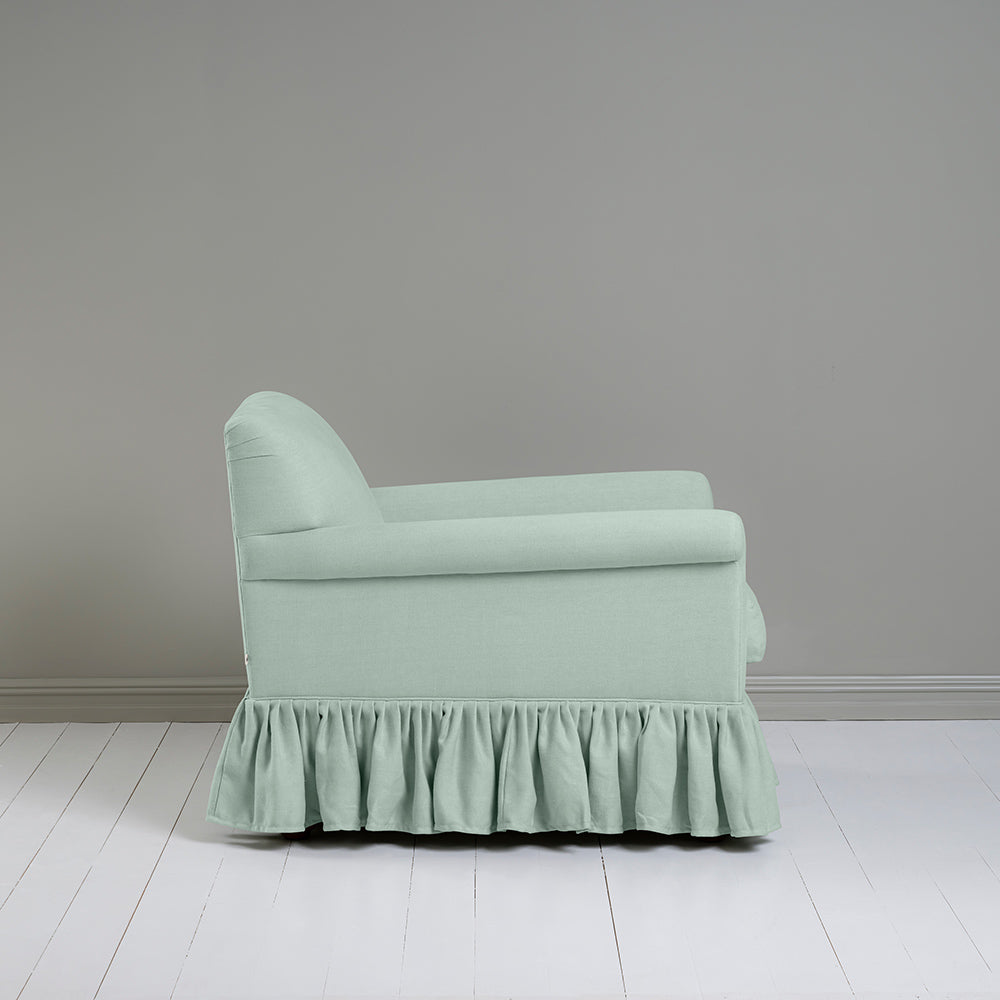 Side View of Curtain Call Armchair in Laidback Linen Sky - Nicola Harding & Co.
