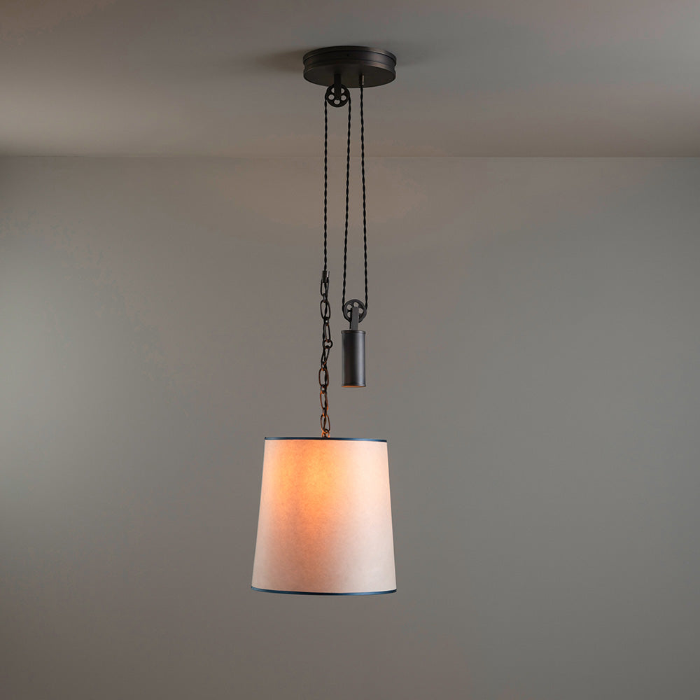 Rise Pendant, Brass with Empire Natural Parchment Lamp Shade with Blue Trim, Hanging From Ceiling With Lights 'ON' - By NiX