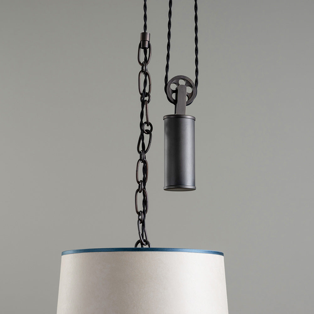 Rise Pendant, Brass with Empire Natural Parchment Lamp Shade with Blue Trim, Hanging From Ceiling Closeup - By NiX