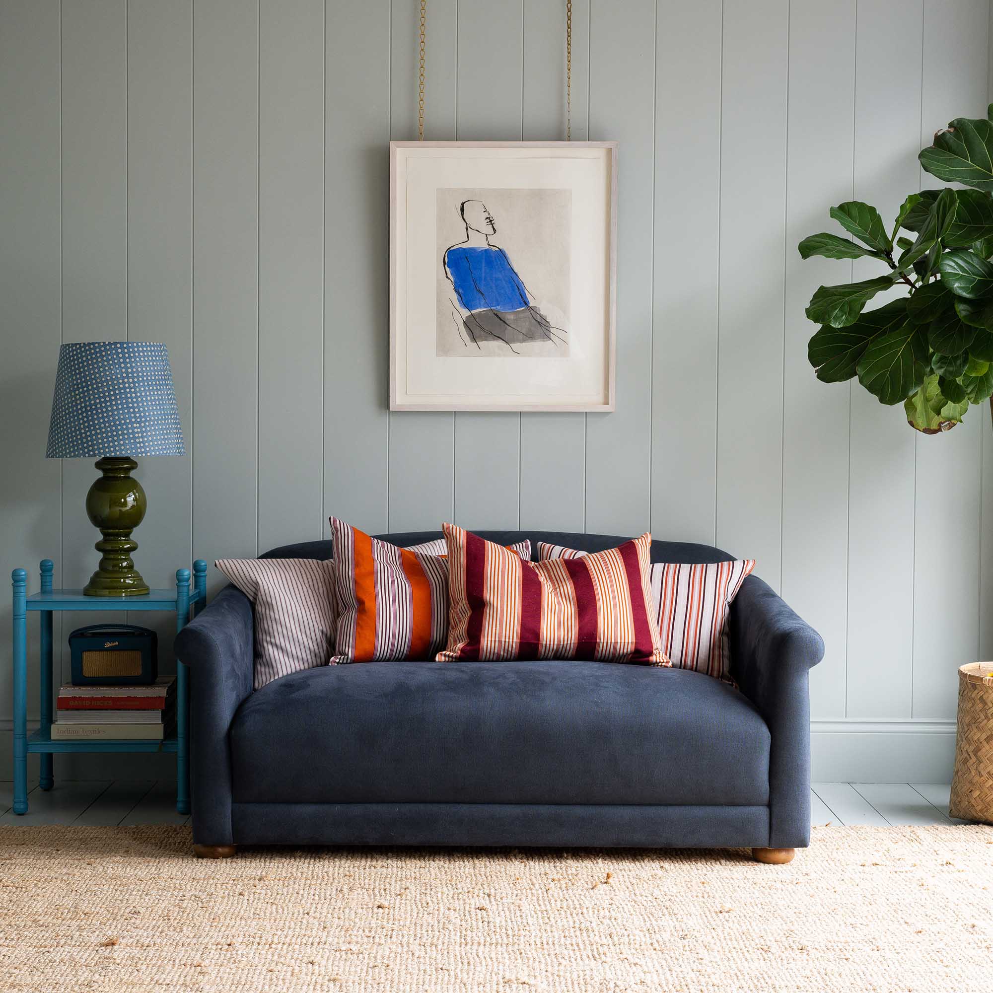 4 Limited Edition Rectangle cushions by NiX decorated on the sofa.