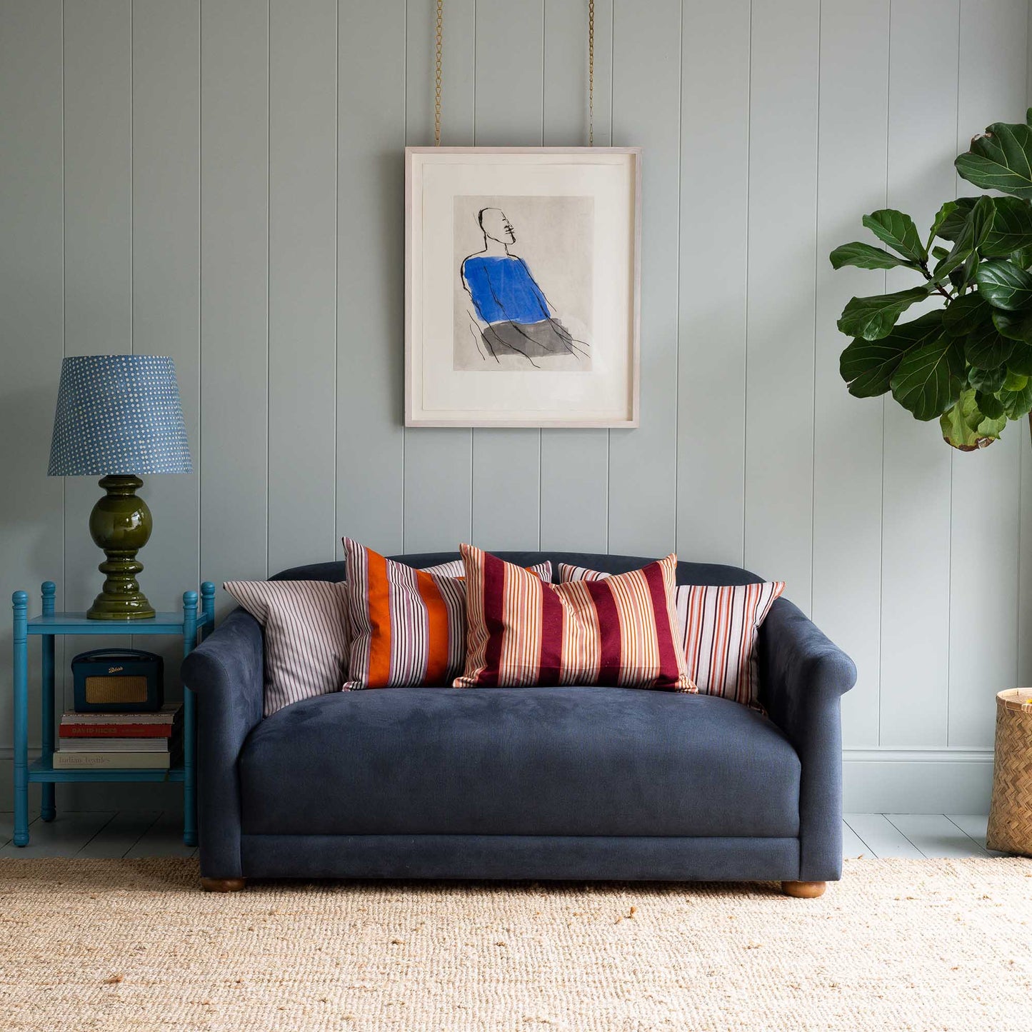 4 Limited Edition Rectangle cushions by NiX decorated on the sofa.