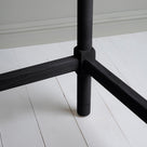 Leg Joint Design Closeup of Black Scribble Desk