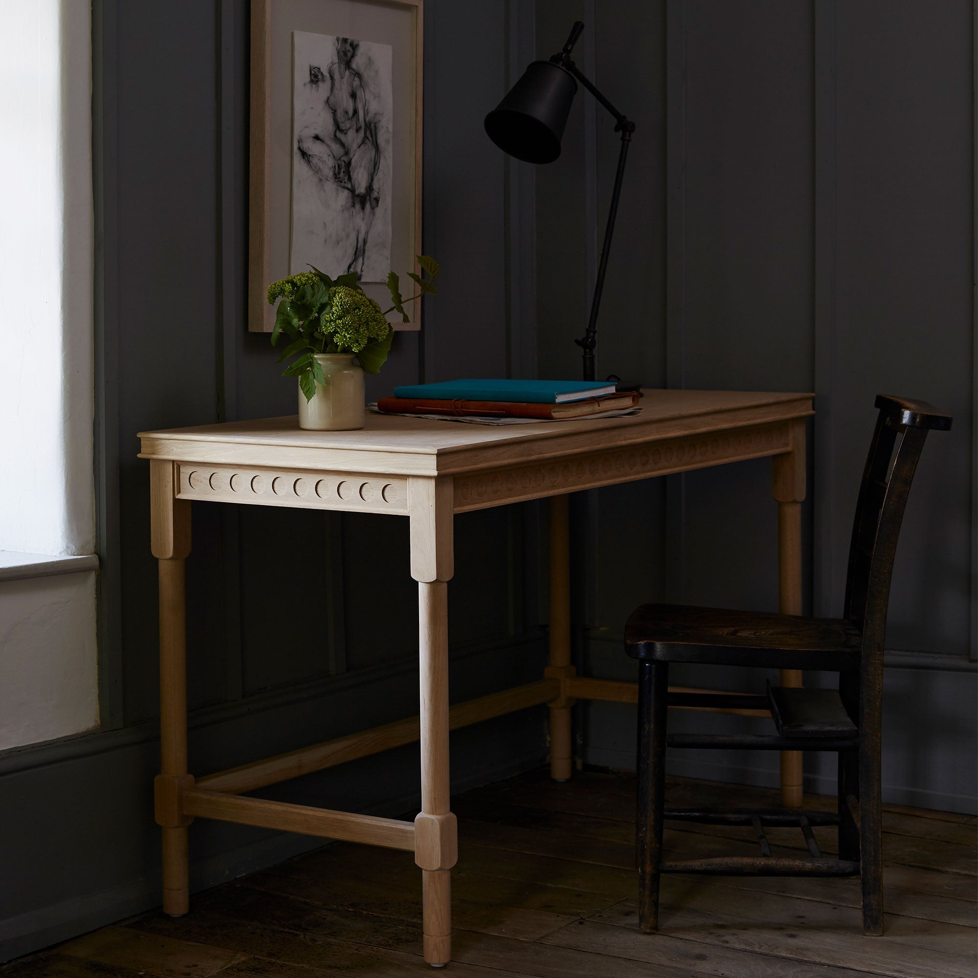 Study Table With Lamp, Books, and Chair - By Nicola Harding & Co.
