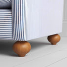 Wooden Foot Design Closeup of NiX Seating in Ticking Cotton, Aqua Brown, – Nicola Harding & Co.