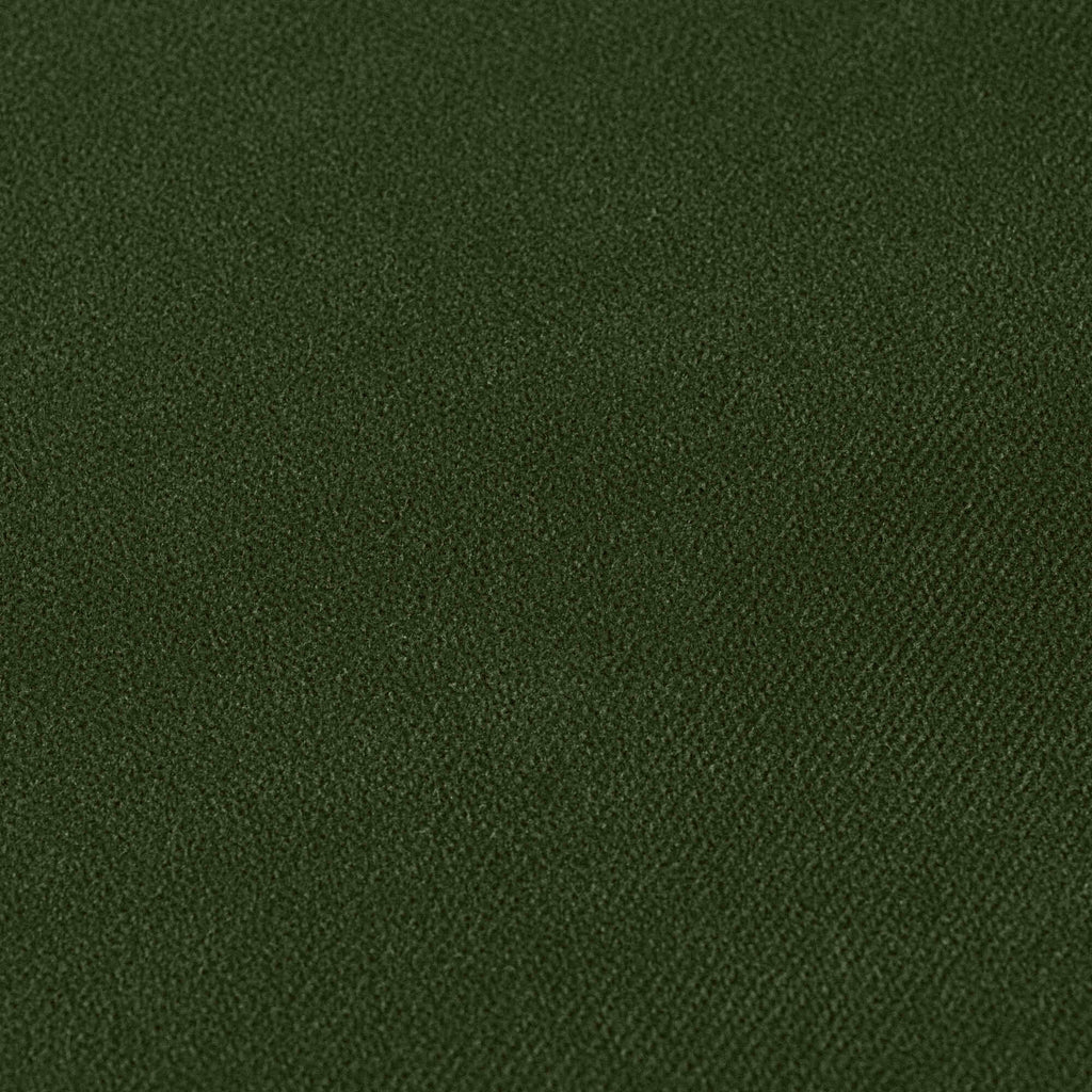 Close up of vibrant green fabric texture.