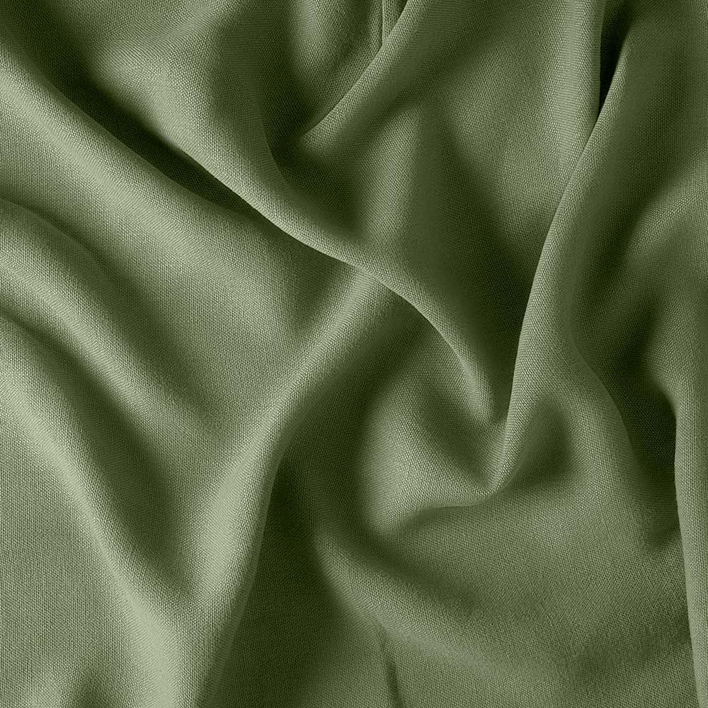Draped Moss green linen fabric showing the soft weave by Nix.