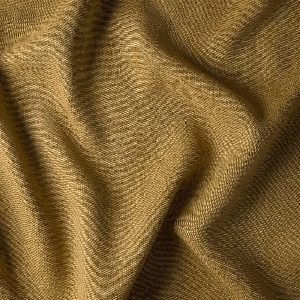 Draped Ochre linen fabric showing the soft weave by Nix.