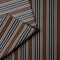 Detailed view of folded Charcoal Regatta cotton material by Nicola Harding.